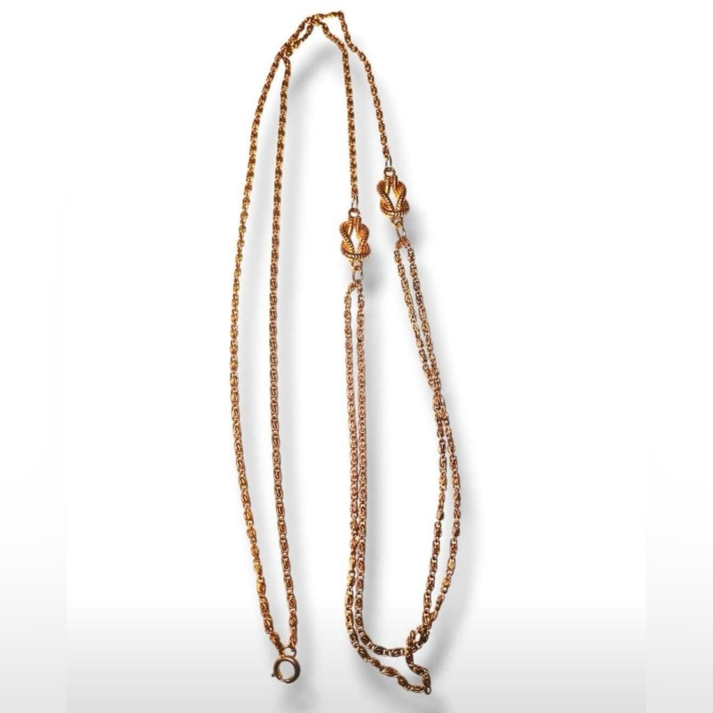 Gold tone chain necklace.